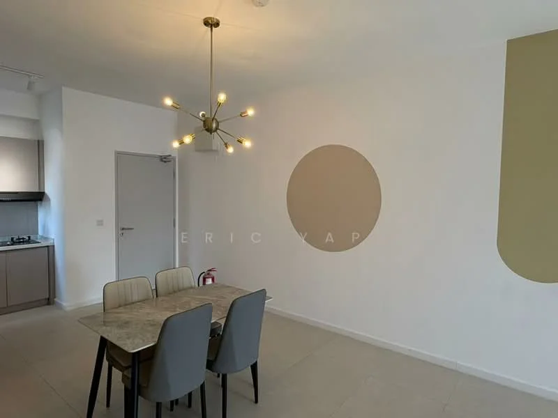 Dining features: 4-seater dining table, beige upholstered dining chairs, modern chandelier with multiple bulbs, white painted walls, accent wall with circular beige design, tile flooring, kitchenette area visible in background, door leading to hallway; style: modern.