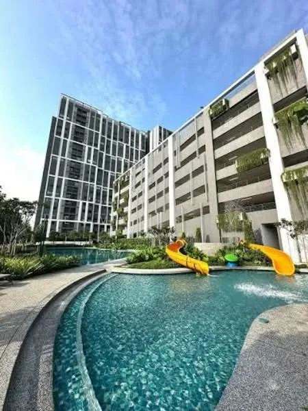 Exterior type: high-rise condominium; features: swimming pool with water slides, landscaped garden, manicured lawn, tropical landscaping, glass curtain wall facade, balconies with greenery, multiple storeys, pool deck with loungers; style: modern.