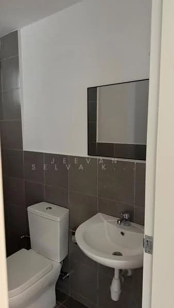 Bathroom features: white toilet, wall-mounted sink, chrome faucet, mirror above sink, grey tiled walls, grey tiled flooring, white painted walls, single towel rail; style: modern.
