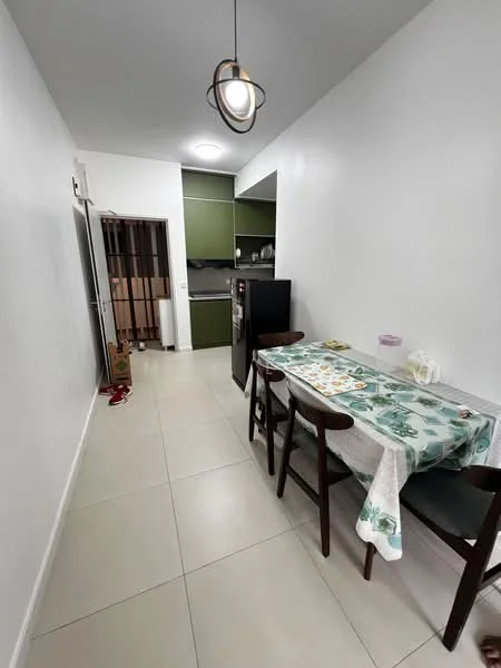 Dining features: white painted walls, tile flooring, dining table with floral tablecloth, 4 wooden dining chairs, refrigerator, kitchen cabinetry in green, ceiling light fixture, open layout to kitchen, wall-mounted partition, doorway to hallway; style: modern.