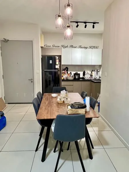 Dining features: wood dining table, 4 upholstered dining chairs in grey, pendant lighting with multiple bulbs, white walls, tile flooring, refrigerator, kitchen cabinetry, countertop, kettle, microwave, stove, sink; style: modern.