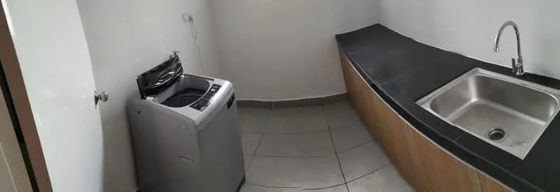 Laundry features: single-bowl stainless-steel sink, chrome pull-down faucet, front-load washing machine, black countertop, wood cabinetry, grey tile flooring, white painted walls; style: modern.