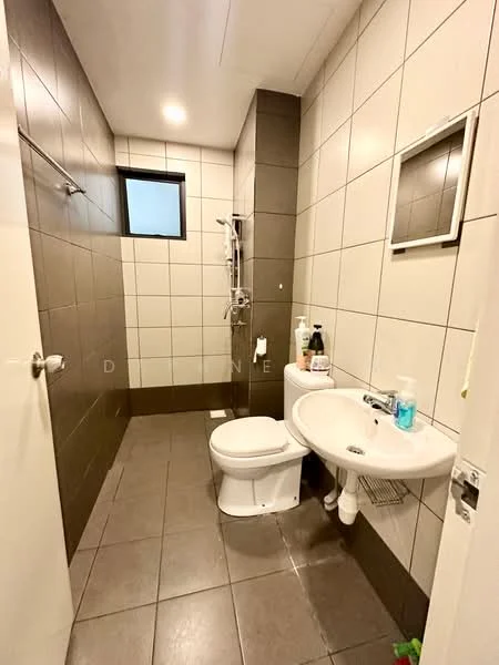Bathroom features: white ceramic toilet, single-sink vanity with wall-mounted faucet, mirror above sink, shower with handheld showerhead, grey tiled walls, white tiled walls, dark grey floor tiles, window for natural light, soap dispenser, toilet paper holder, towel bar; style: modern.