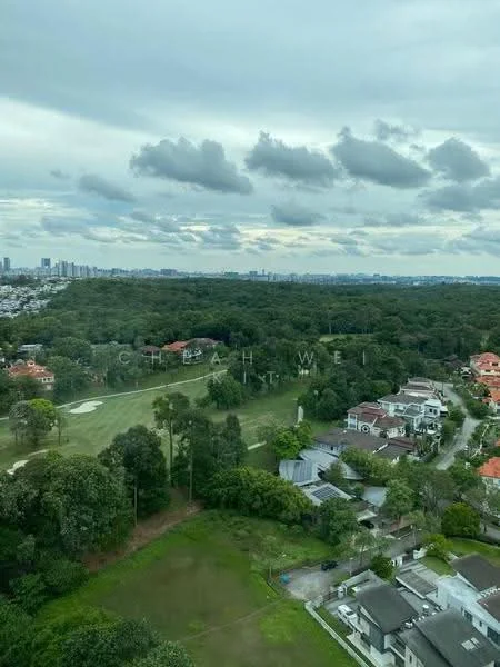 Exterior type: high-rise condominium; features: city skyline in background, lush green golf course, residential houses visible, surrounded by greenery, cloudy sky, urban landscape; style: modern.