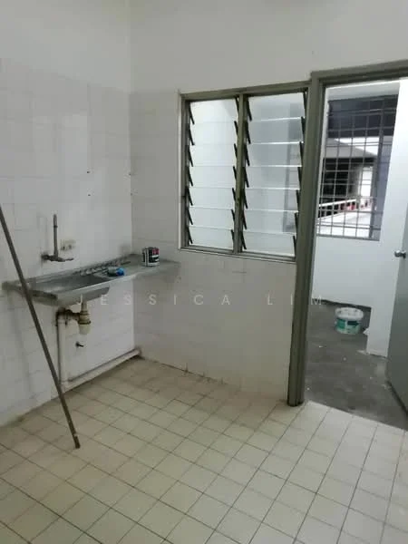 Kitchen features: white tiled walls, white tiled flooring, single-bowl stainless-steel sink, chrome faucet, window with metal grilles, open doorway, empty wall space, no visible appliances.