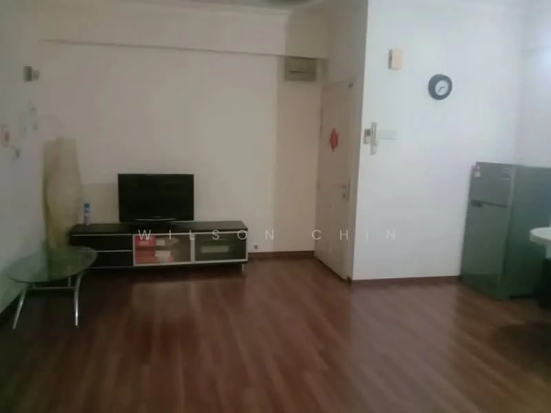 Living features: laminate flooring, white painted walls, wall-mounted TV, black TV console, glass coffee table, refrigerator, door, clock on wall.
