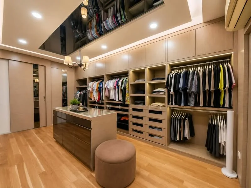 Room features: built-in wardrobe with open shelving, hanging space for clothes, drawers for storage, island with countertop, round ottoman, wooden flooring, recessed lighting, ceiling light fixture, mirrored ceiling, neutral wall color; style: modern.