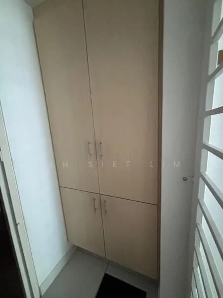 Room features: built-in cabinets, light wood cabinetry, four-door cabinet, grey tiled flooring, white walls, door frame, black mat at entrance; style: modern.