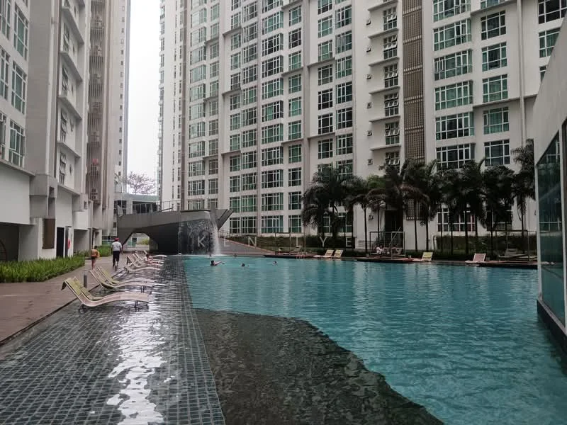 Exterior type: high-rise condominium; features: infinity pool, pool deck with loungers, water feature with cascading waterfall, surrounded by palm trees, glass curtain wall facade, manicured landscaping, multiple storeys, urban setting; style: modern.