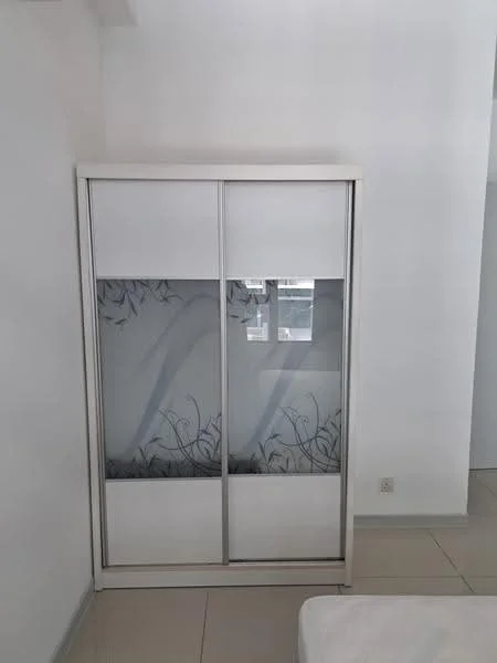 Room features: sliding wardrobe with mirrored doors, white cabinetry, decorative floral pattern on glass, neutral wall colour, light-coloured floor tiles; style: modern.