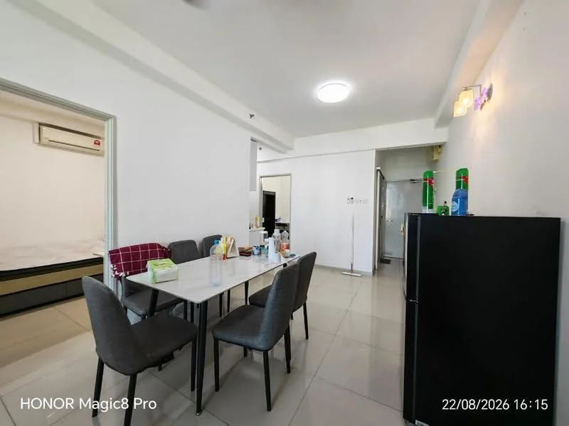 Dining features: 6-seater dining table, grey upholstered dining chairs, white table surface, tile flooring, refrigerator, wall-mounted air conditioning unit, light fixture on ceiling, neutral wall colour, open layout to living area; style: modern. Room features: bed visible in background, doorway leading to another room.