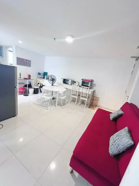 Living features: red fabric sofa, white dining table, 4 white dining chairs, 2 microwaves, 1 fan, white tiled flooring, white painted walls, recessed downlights, kitchenette area with appliances, open layout, decorative wall art; style: modern.