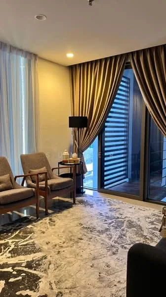 Living features: two armchairs in wood, black floor lamp, floor-to-ceiling windows, sheer curtains, blackout curtains, marble flooring, decorative wall with light, textured wall, decorative items on side table; style: modern.
