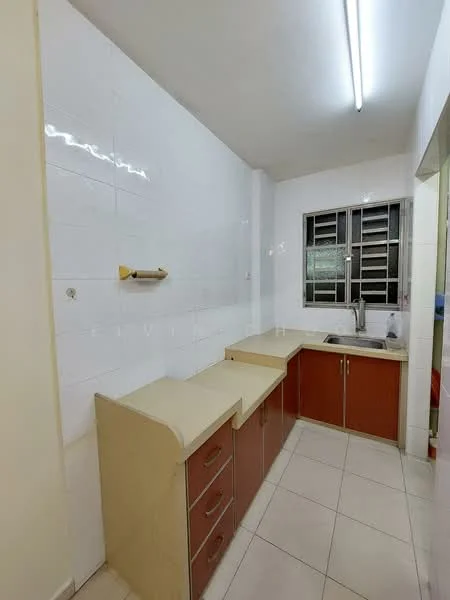 Kitchen features: white tiled walls, light-colored countertop, brown wooden cabinetry, single-bowl stainless-steel sink, chrome faucet, window with metal grilles, fluorescent ceiling lights, ceramic tile flooring.
