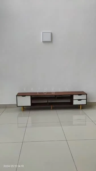 Room features: white painted walls, glossy ceramic tile flooring, wooden TV console with white drawers, golden legs on TV console, minimalist design, single wall-mounted light fixture; style: modern.