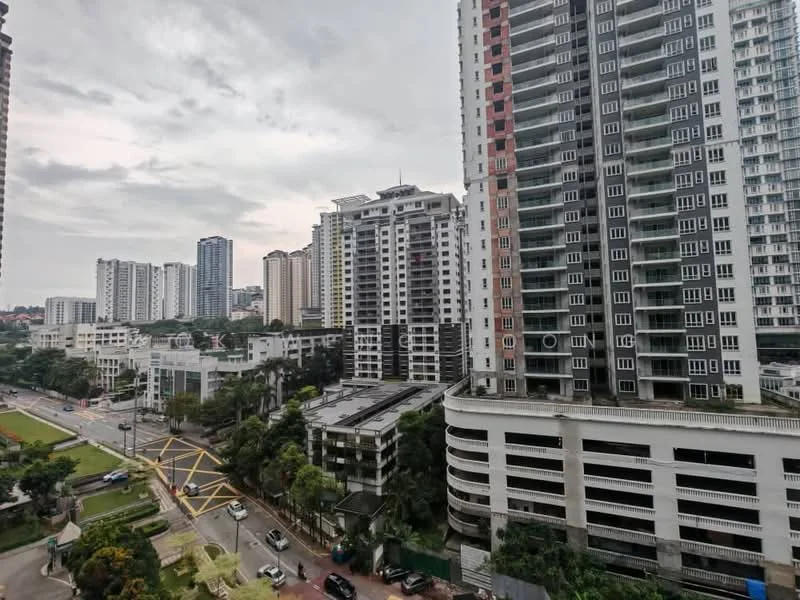 Exterior type: high-rise condominium; features: glass curtain wall, white painted facade, recessed balconies, surrounded by mature greenery, urban context with city skyline, multiple storeys, parking deck visible, manicured landscaping; style: modern.