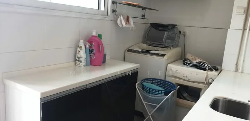 Laundry features: white countertop, black cabinetry, top-load washing machine, front-load dryer, plastic laundry basket, plastic waste bin, white tiled walls, grey tiled flooring.