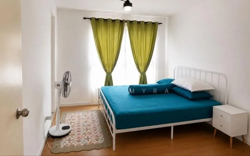 Bedroom features: queen-size bed with blue bedding, white metal bed frame, two white pillows, green curtains, floor-to-ceiling windows, wooden flooring, white bedside table, decorative area rug with geometric pattern, standing fan; style: minimalist.