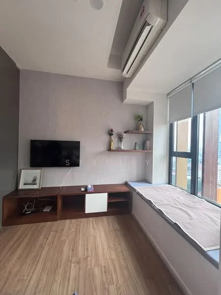 Living features: wooden flooring, light grey painted walls, wall-mounted TV, wooden TV console, white cabinet, decorative shelf, window seat with cushion, floor-to-ceiling windows, roller blinds, wall-mounted air conditioning unit; style: modern; view: city.