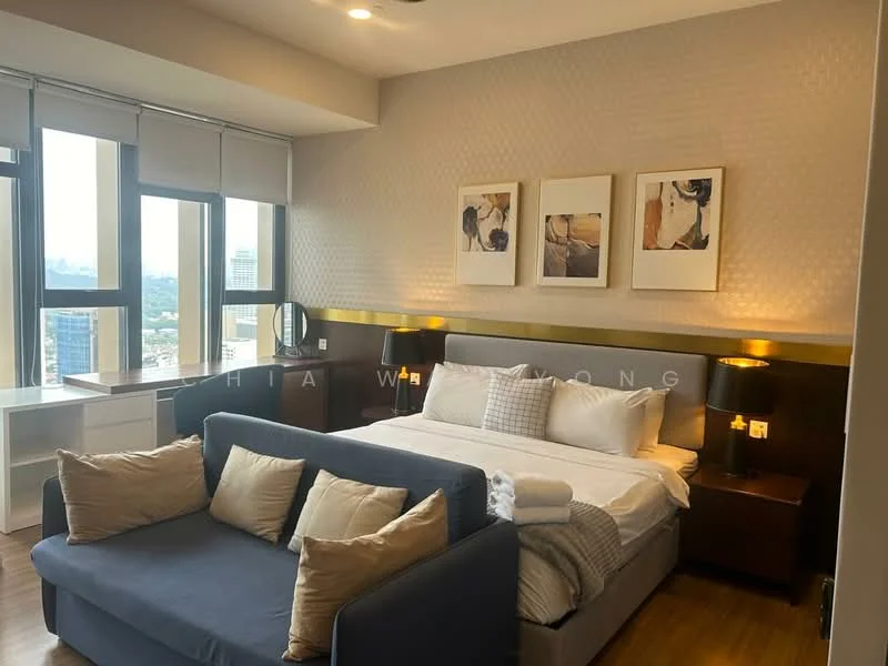Bedroom features: king-size bed with white bedding, upholstered headboard, 2 bedside lamps with black shades, sofa in grey fabric with beige cushions, wooden flooring, feature wall with textured wallpaper, framed artwork on walls, floor-to-ceiling windows with city view, built-in wardrobe, recessed ceiling lights; style: modern; view: city.