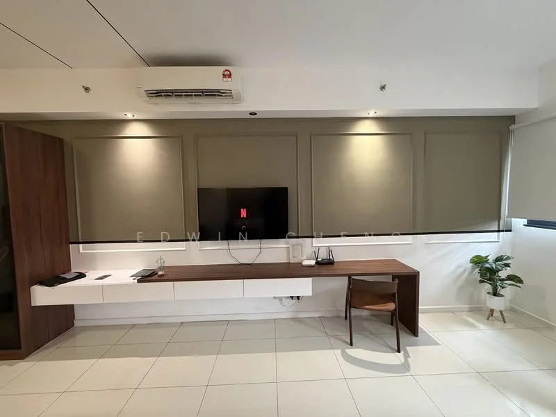 Living features: white painted walls, light grey accent wall, floor-to-ceiling windows, recessed downlights, wall-mounted TV, wooden console table, single wooden chair, air conditioning unit, ceramic tile flooring, indoor plant in ceramic pot; style: modern.