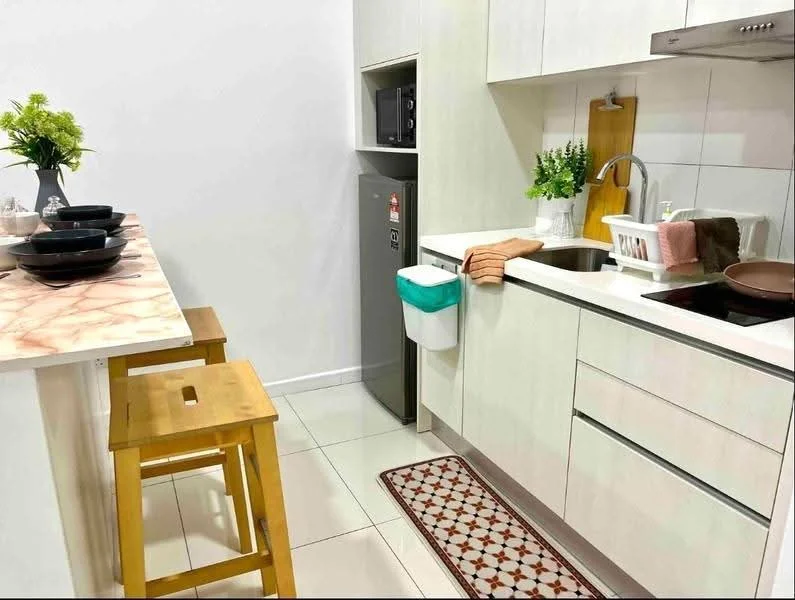 Kitchen features: white cabinetry, marble countertop, stainless-steel sink, chrome pull-down faucet, built-in oven, microwave, stainless-steel fridge, tile flooring, decorative rug, wooden bar stools, potted plant, kitchen utensils, dish rack; style: modern.