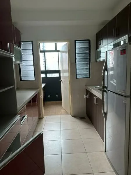 Kitchen features: brown cabinetry, white countertops, stainless-steel fridge, built-in oven, ceramic tile flooring, window with sliding shutters, open shelving, sink, kitchen island, light fixture, door leading to balcony; style: modern.
