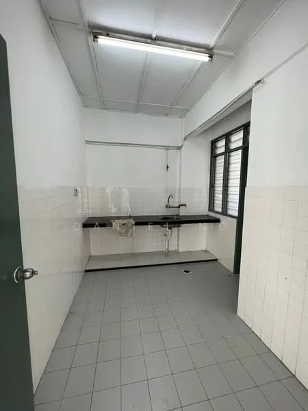 Laundry features: white tiled walls, grey tiled flooring, single-bowl stainless-steel sink, chrome faucet, black countertop, window with metal grilles, fluorescent ceiling lights, drainage outlet on floor.
