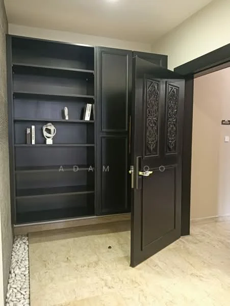 Room features: dark wood cabinetry, open shelving, decorative carvings on door, marble flooring, light-colored wall, pebble stone detail at base, door with handle, built-in storage; style: modern.