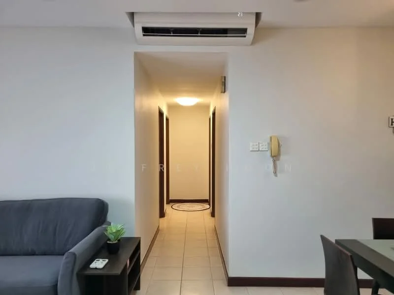 Room features: grey fabric sofa, tile flooring, white painted walls, recessed ceiling light, wall-mounted air conditioning unit, doorway leading to hallway, decorative plant on table, round area rug; style: modern.