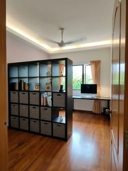 Study features: wooden flooring, white painted walls, ceiling fan, built-in desk, black bookshelf with storage boxes, window with curtains, computer monitor, decorative items on shelves; style: modern; view: garden.