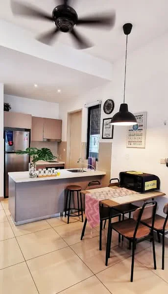 Kitchen features: stainless-steel fridge, built-in oven, 4-burner gas hob, kitchen island with seating, pendant light, 5-blade ceiling fan, cream cabinetry, white countertop, tile flooring, open shelving, decorative plants, dining table with chairs, table runner; style: modern.