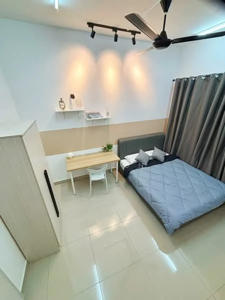 Bedroom features: queen-size bed with grey bedding, upholstered headboard, two bedside pillows, study desk with wooden surface, white chair, built-in wardrobe, grey curtains, recessed downlights, 5-blade ceiling fan, cream painted walls, tile flooring; style: modern.