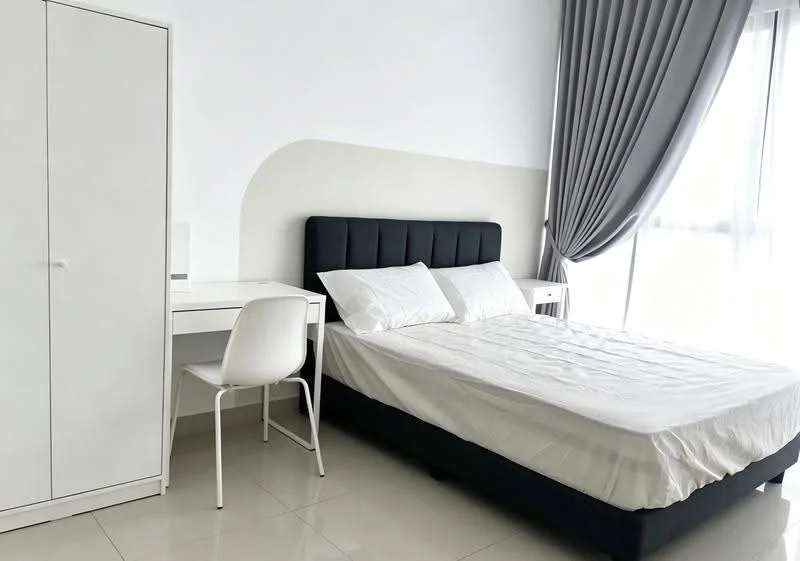 Bedroom features: queen-size bed with upholstered headboard, white bedding, white walls, grey curtains, white study desk, white chair, built-in wardrobe with sliding doors, tile flooring; style: modern.