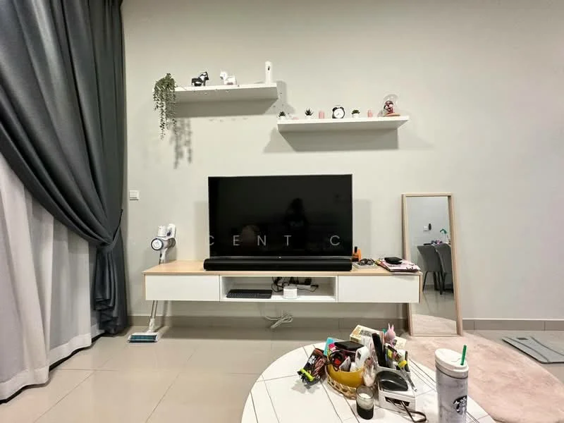 Living features: grey curtains, white wall, flat-screen TV on media console, white media console with drawers, decorative shelf above TV, mirror on floor, coffee table, decorative items on coffee table, light-colored flooring, plant on shelf; style: modern.