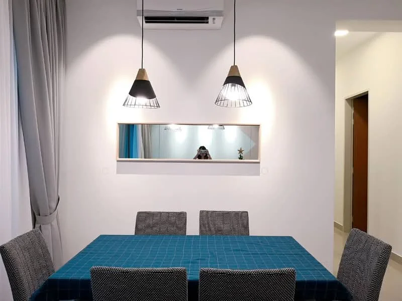 Dining features: 6-seater dining table with blue tablecloth, 4 upholstered dining chairs, pendant lighting with black wire shades, wall-mounted mirror, light grey painted walls, curtains in light fabric, air conditioning unit on the ceiling, flooring in light tiles; style: modern.