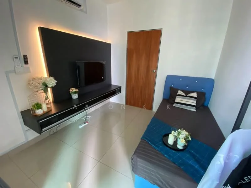 Bedroom features: single bed with blue upholstered headboard, dark brown bed linens, wall-mounted TV, black floating TV console, white walls, glossy tile flooring, decorative plant in ceramic pot, blue throw blanket, striped decorative pillows, wooden door, air conditioning unit; style: modern.