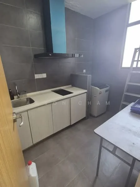 Kitchen features: single-bowl stainless-steel sink, chrome pull-down faucet, built-in induction hob, stainless-steel range hood, light grey cabinetry, grey tiled backsplash, grey floor tiles, window with natural light, countertop with storage underneath, white refrigerator, metal ladder, table with grey surface; style: modern.
