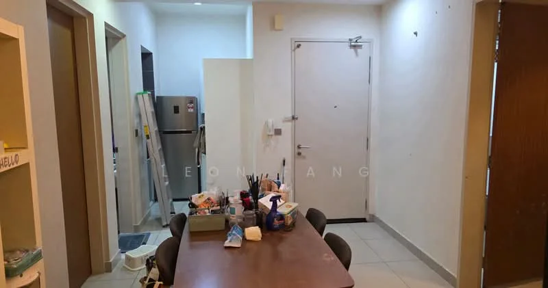 Room features: white painted walls, tile flooring, wooden dining table, four dining chairs, refrigerator visible in background, door leading to bathroom, door leading to entrance, ladder leaning against wall, various items on dining table.