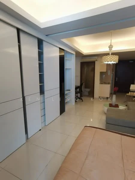 Room features: white sliding wardrobe, cream wall, recessed ceiling lights, tile flooring, chandelier, open shelving, grey sofa, desk with chair, partition wall, doorway leading to bathroom; style: modern.
