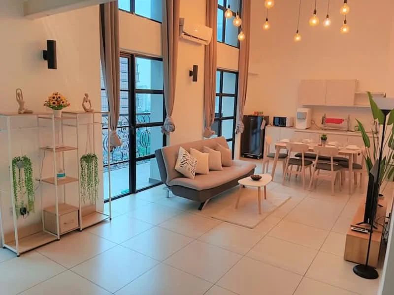 Living features: 3-seater fabric sofa in light grey, coffee table, area rug, floor-to-ceiling windows, curtains, wall-mounted air conditioning unit, dining table with chairs, open shelving unit, decorative plants, wall decor, pendant lighting, white walls, tile flooring; style: modern; view: city.