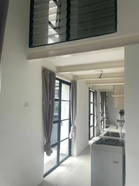 Room features: white painted walls, tile flooring, floor-to-ceiling windows, grey curtains, open space layout, ceiling with exposed beams, kitchen area with sink, kitchen cabinetry, light fixture, laundry area with washing machine; style: modern.