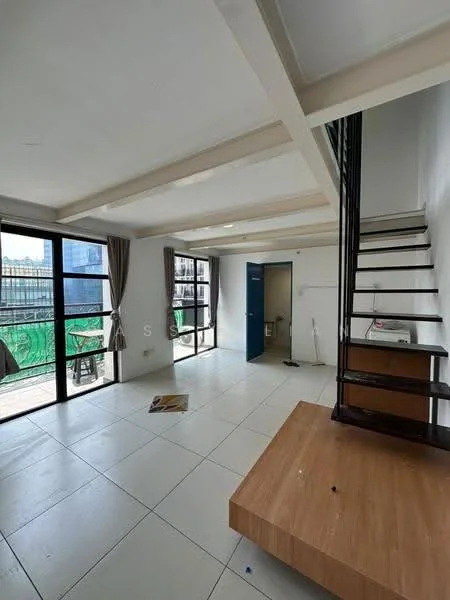 Living features: white painted walls, tile flooring, exposed beams on ceiling, floor-to-ceiling windows, sliding glass door, curtains, staircase, wooden platform, utility area with washing machine, light fixtures; style: modern; view: city. Room features: white painted walls, tile flooring, doorway to bathroom, light fixtures.