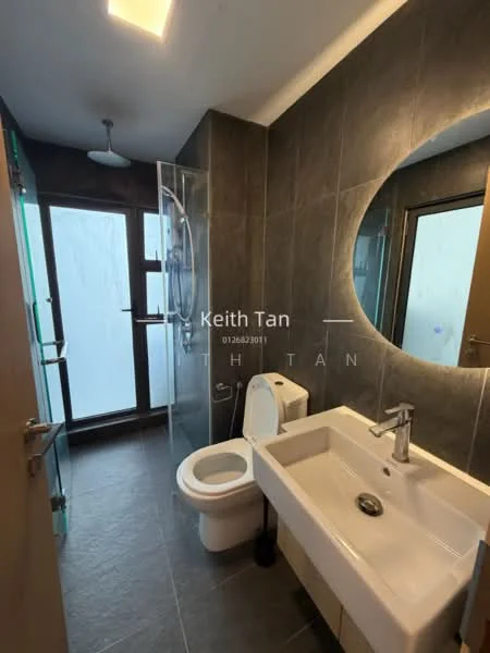 Bathroom features: grey tiled walls, grey tiled flooring, walk-in shower with glass enclosure, rain shower head, single-sink vanity with white cabinet, chrome basin mixer faucet, round mirror, one-piece toilet, window with frosted glass, ceiling light, sliding glass door; style: modern.
