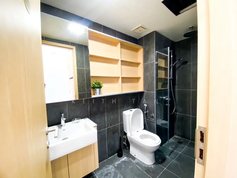 Bathroom features: grey tiled walls, black tiled flooring, single-sink vanity with wood cabinet, chrome basin mixer faucet, framed mirror, one-piece toilet, walk-in shower with glass enclosure, rain shower head, built-in shelving, plant decor; style: modern.