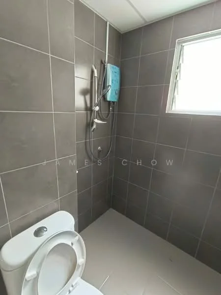 Bathroom features: grey tiled walls, white ceramic toilet, shower with handheld showerhead, window for natural light, light grey tiled flooring; style: modern.