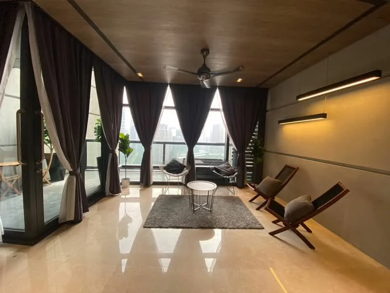 Living features: floor-to-ceiling windows, grey curtains, wooden ceiling, 5-blade ceiling fan, marble flooring, area rug, 2 wooden lounge chairs, round coffee table, indoor plants, wall-mounted lighting; style: modern; view: city. Balcony features: outdoor seating, glass railing; view: city.