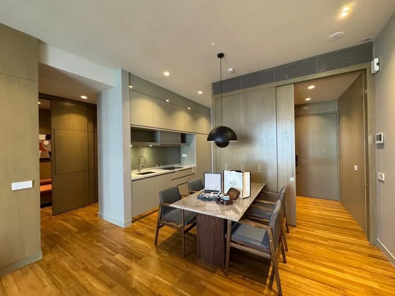 Dining features: wood dining table, 4 upholstered dining chairs, pendant light, wooden flooring, grey cabinetry, white countertop, built-in kitchen with sink, recessed downlights, open layout, wall-mounted thermostat; style: modern. Kitchen features: grey cabinetry, white countertop, single-bowl stainless-steel sink, built-in oven, recessed downlights; style: modern. Room features: wooden flooring, recessed downlights, wall paneling.