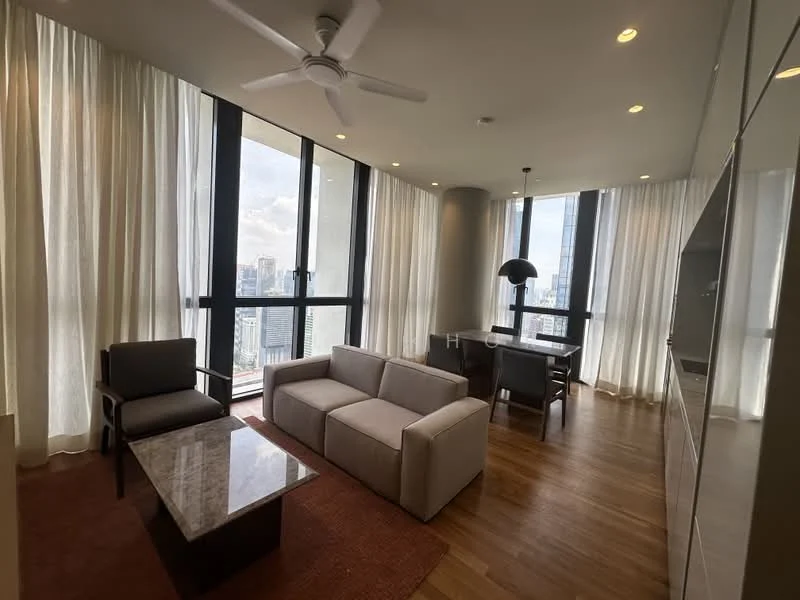 Living features: 3-seater fabric sofa in light grey, coffee table with marble top, armchair in dark fabric, area rug with geometric pattern, floor-to-ceiling windows, sheer curtains, wooden flooring, ceiling fan with light, wall-mounted TV, dining table for 4, modern pendant lamp; style: modern; view: city.