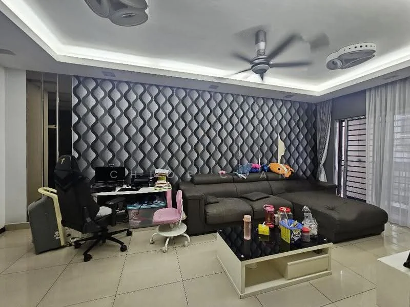 Living features: grey patterned accent wall, cream painted walls, recessed ceiling with LED lighting, 5-blade ceiling fan with light, large sliding glass door, floor-to-ceiling windows, light-colored tiled flooring, L-shape sectional sofa in dark grey, coffee table, computer desk with chair, decorative plush toys, decorative items on table; style: modern.